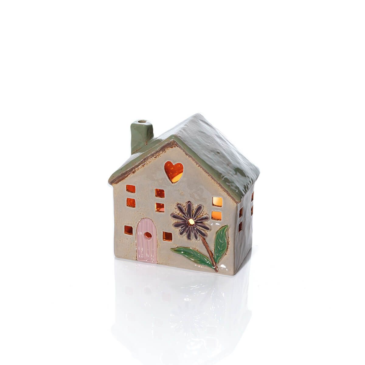Shabbyquins stoneware house-shaped candle holder with rustic finish, designed for tea lights or small candles.