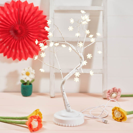 Warm Glow LED Blossom Tree decorative ornament by Shabbyquins featuring illuminated pink blossoms on a natural branch display.