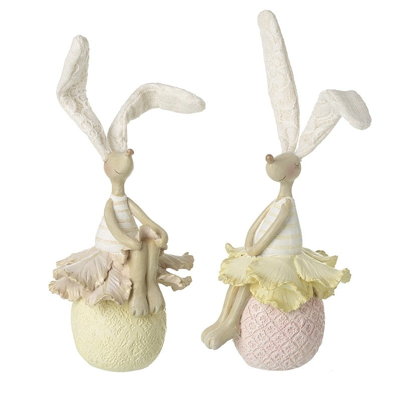 Resin Rabbits Perched On Eggs