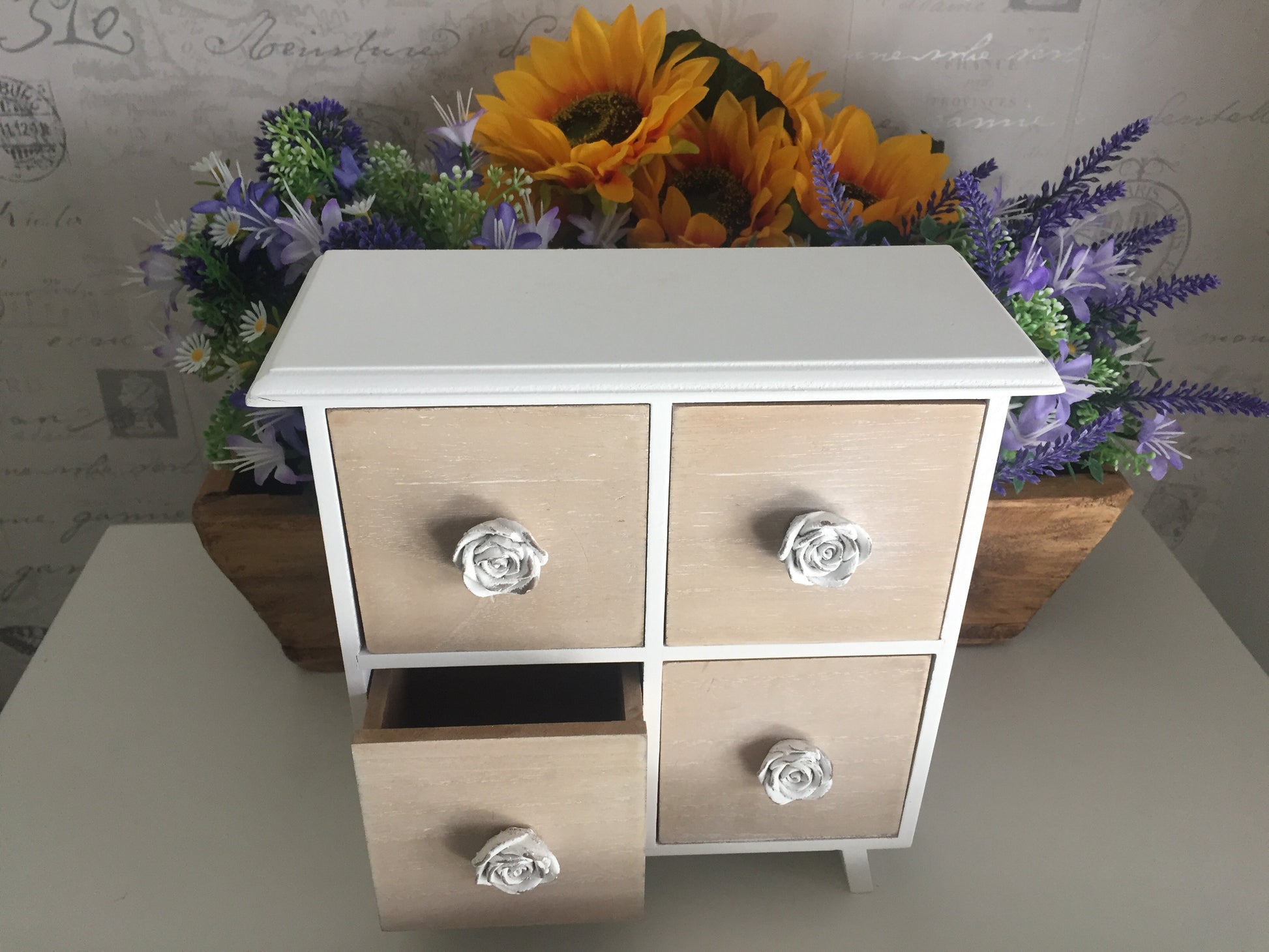 4 drawer cabinet with rose handles