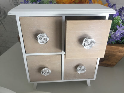 4 drawer cabinet with rose handles