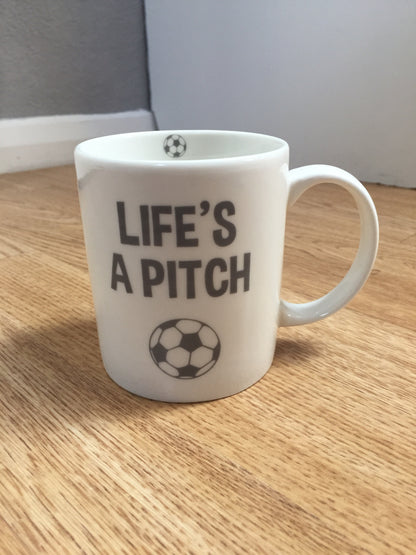 Life’s A Pitch Football Mug