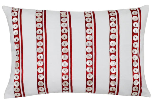 White buttons on red stripes cushion