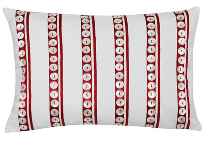 White buttons on red stripes cushion